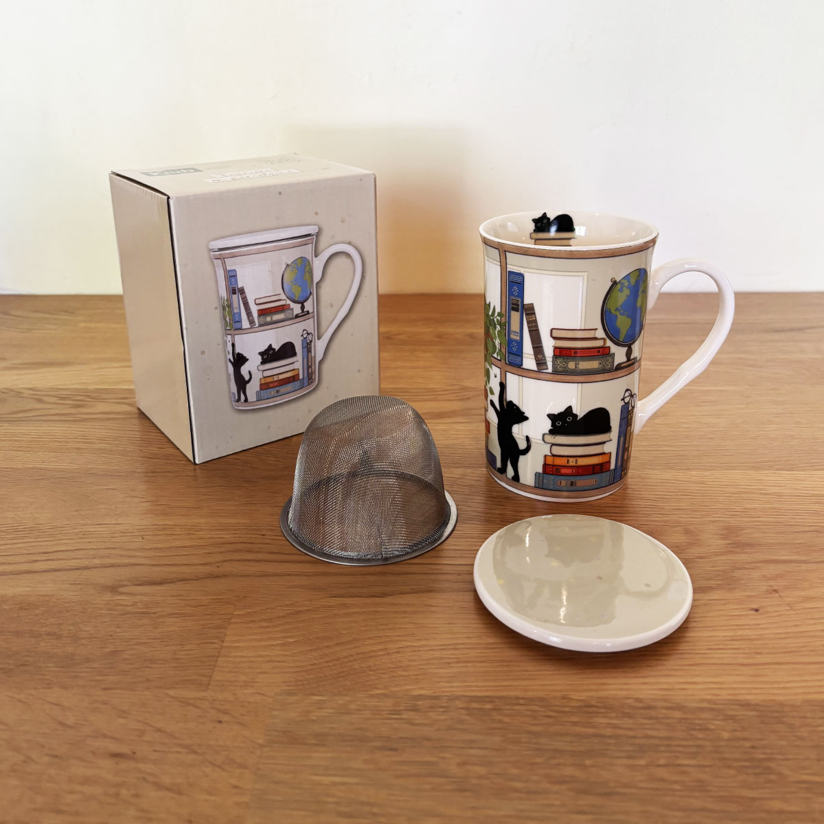 Tisanire en Porcelaine  Chaton dans la Bibliothque