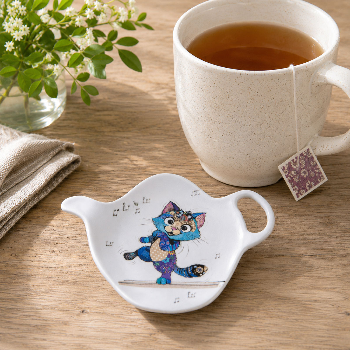 Repose-sachet de th� chat en m�lamine