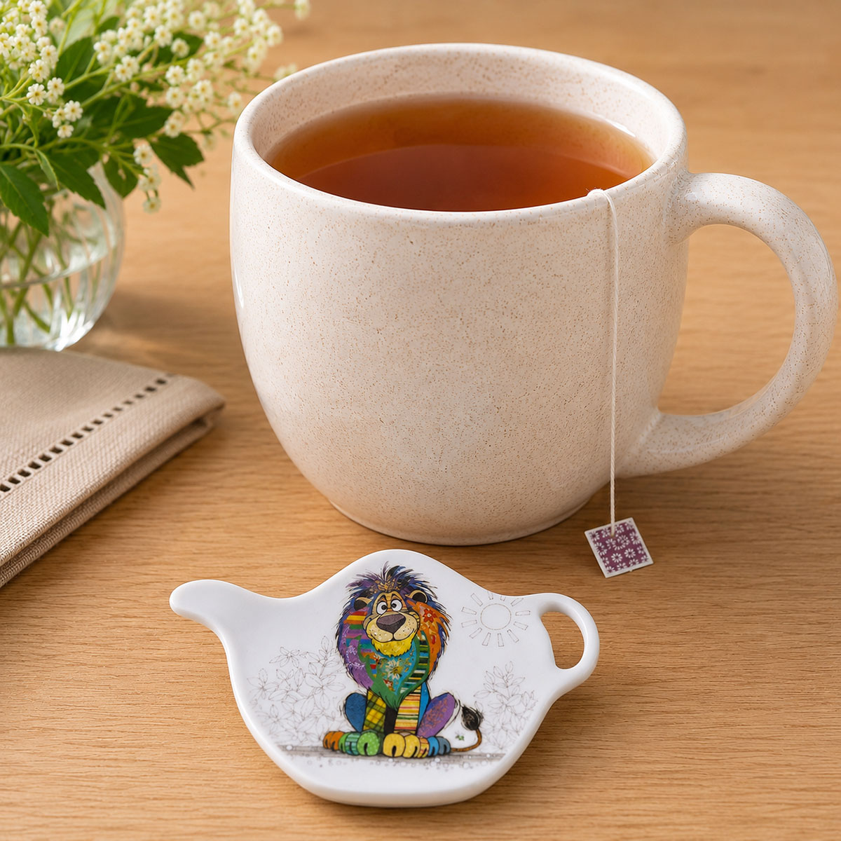 Repose-sachet de th� lion en m�lamine