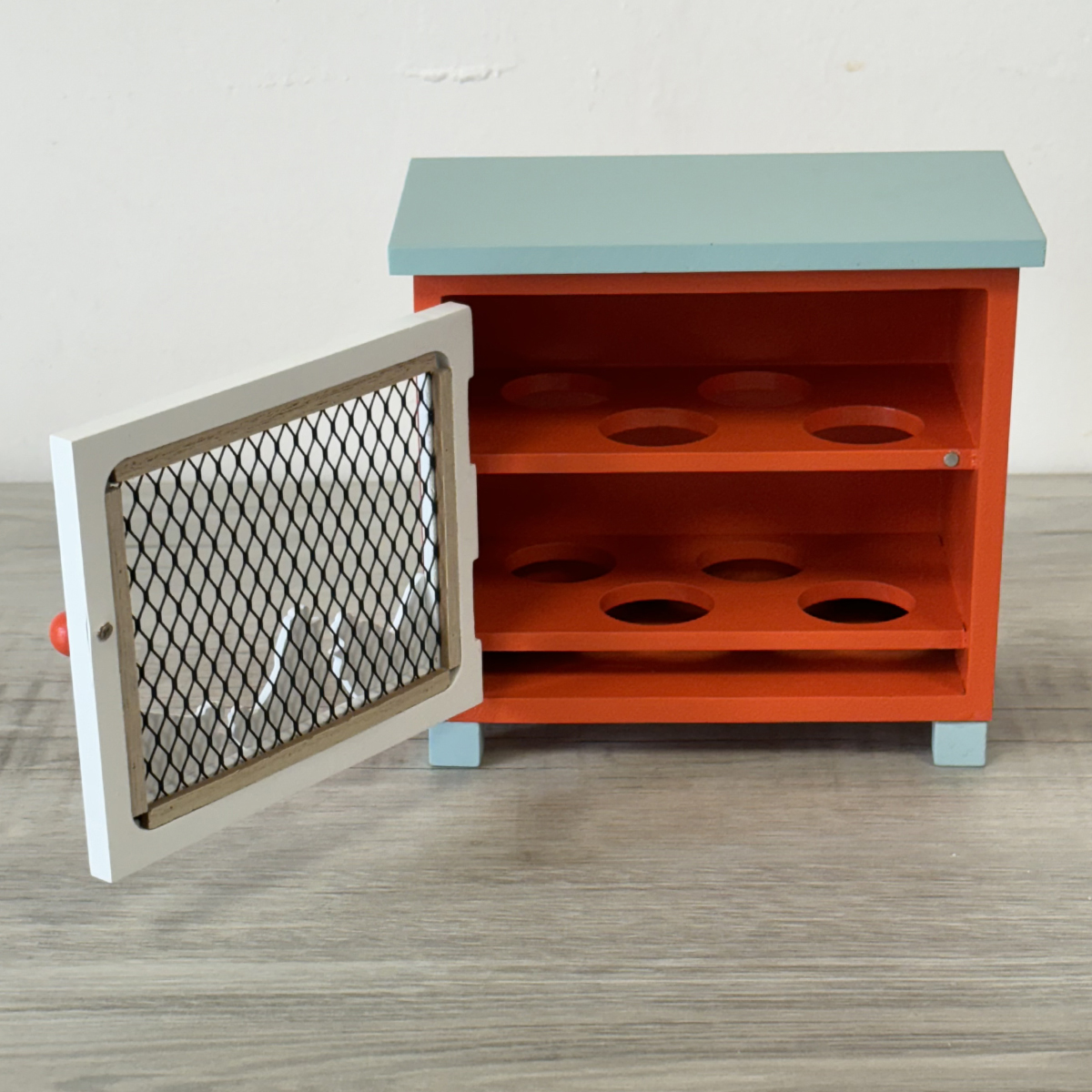 Cave � �ufs en bois orange et bleu 8 �ufs