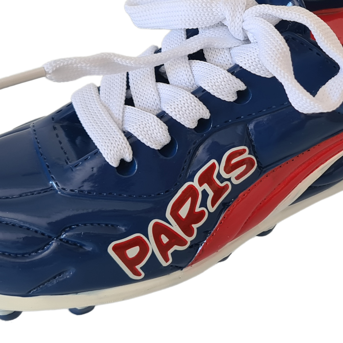 Tirelire chaussure de foot en cramique Paris